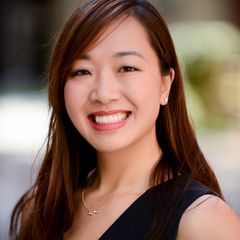Image of woman from chest up standing while looking at camera. She is Image of woman from waist up standing while looking at camera. She is Elaine Lau