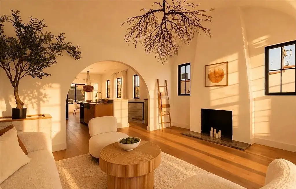 Echo Park home staging open-concept living room with fireplace and kitchen view